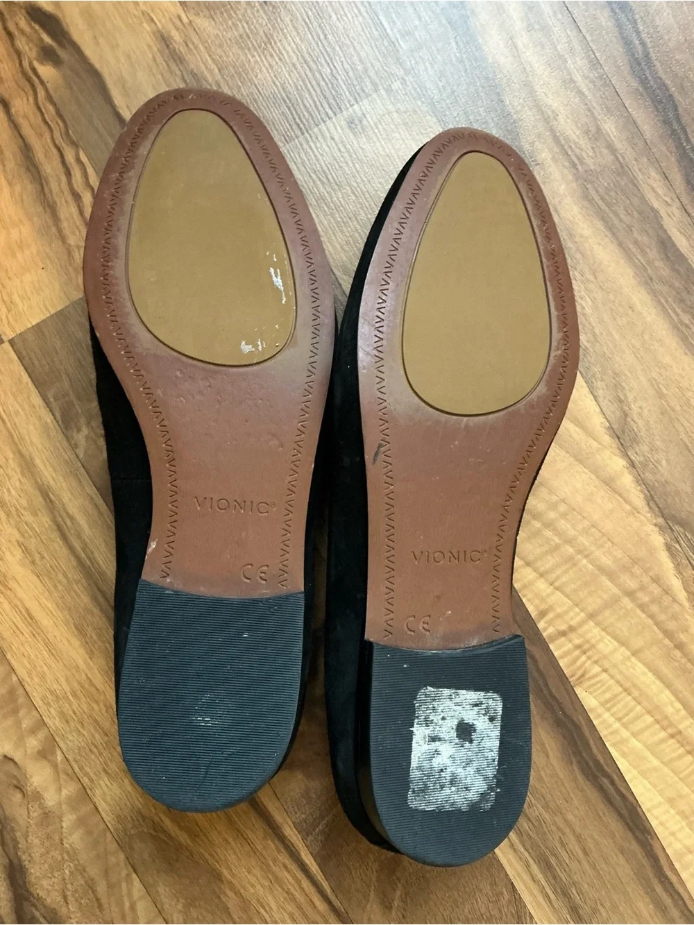 Vionic women’s Black Suede Slip-On Loafers — Minimalist Design